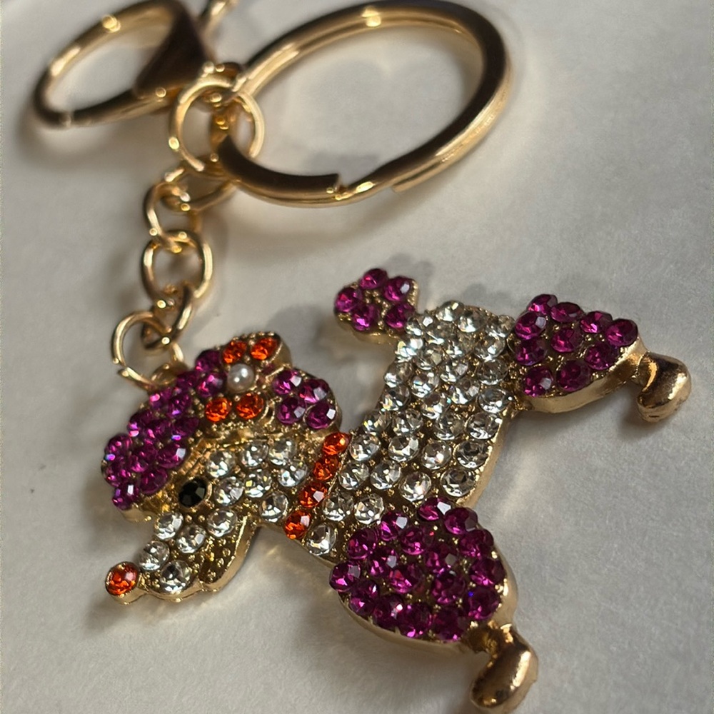 Sparkling poodle dog Keychain with purple orange Accents